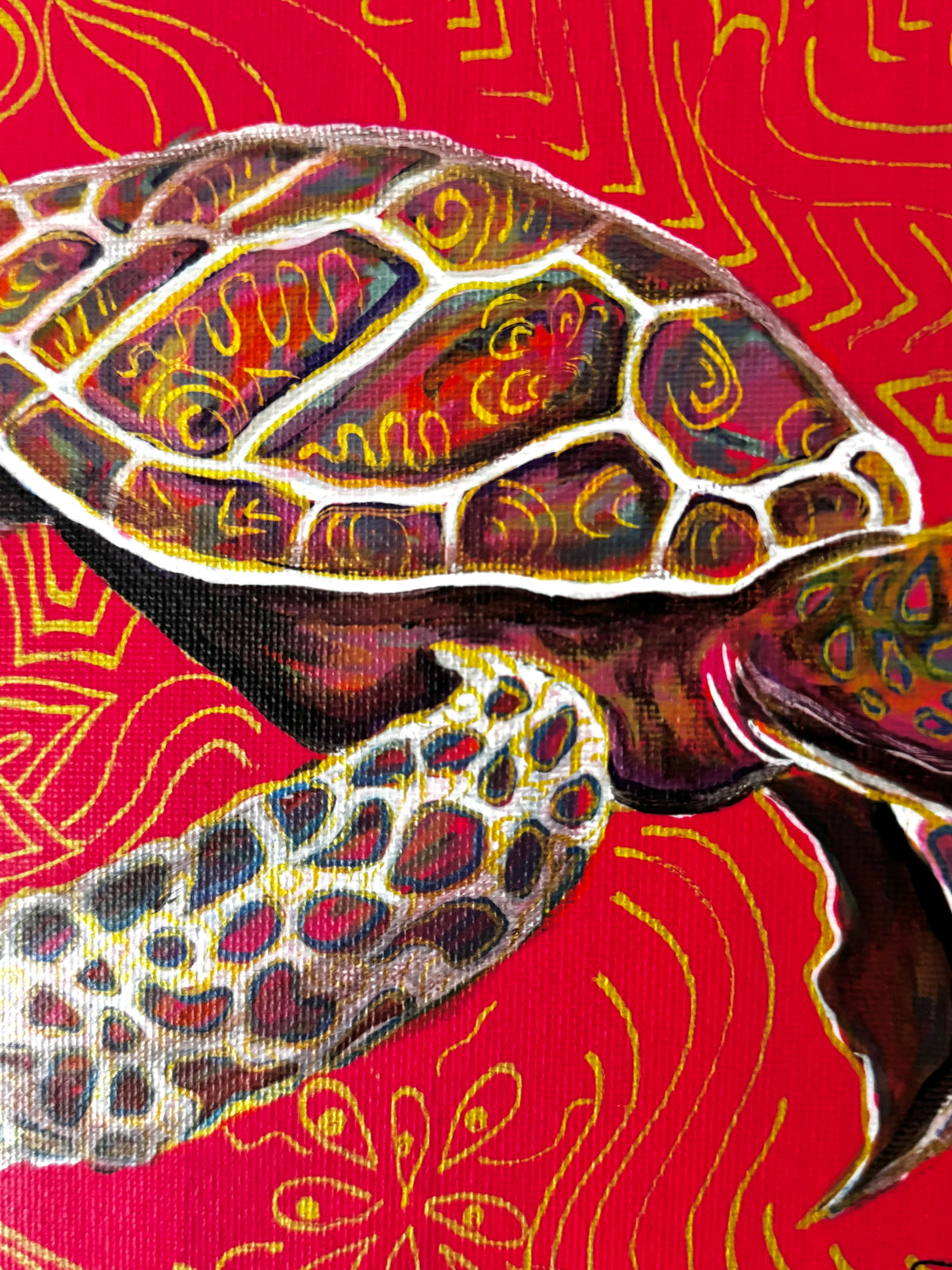 A-close-up-of-a-colorful-sea-turtle-artwork-on-a-bright-red-background-with-yellow-abstract-wave-patterns-The-turtle-shell-and-flippers-feature-intricate-multicolor-detailing-in-orange-yellow-green-and-dark-tones.